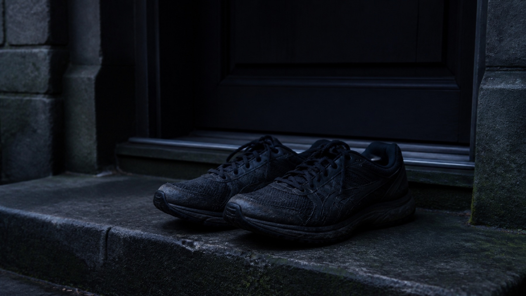 Training shoes on a doorstep